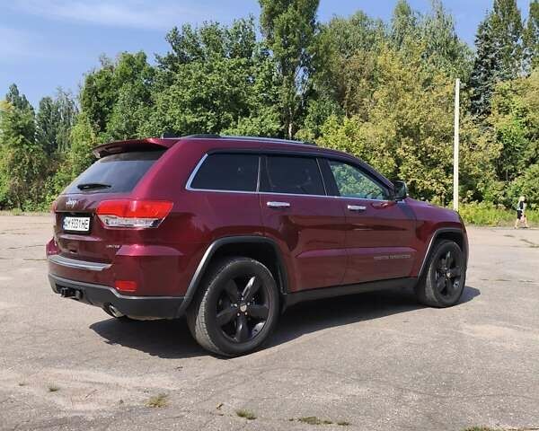Червоний Джип Grand Cherokee, об'ємом двигуна 3.6 л та пробігом 112 тис. км за 25000 $, фото 6 на Automoto.ua