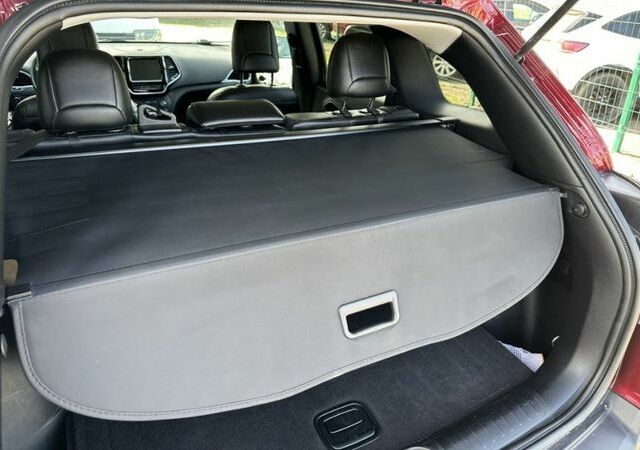 Красный Джип Гранд Чероки, объемом двигателя 2.4 л и пробегом 99 тыс. км за 19800 $, фото 22 на Automoto.ua