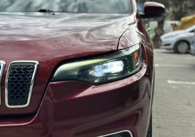 Красный Джип Гранд Чероки, объемом двигателя 2.4 л и пробегом 99 тыс. км за 19800 $, фото 2 на Automoto.ua