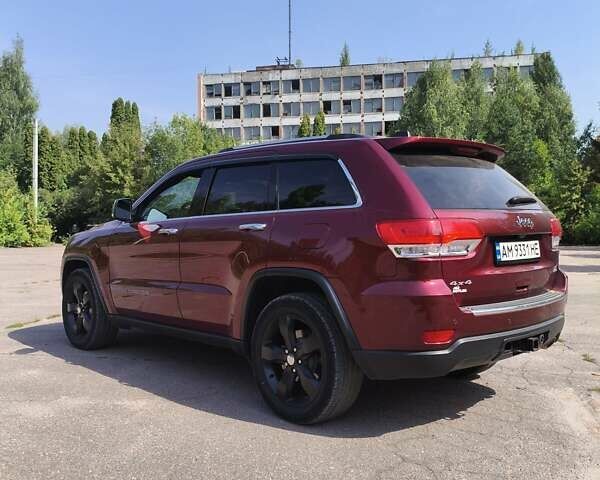 Червоний Джип Grand Cherokee, об'ємом двигуна 3.6 л та пробігом 112 тис. км за 25000 $, фото 1 на Automoto.ua