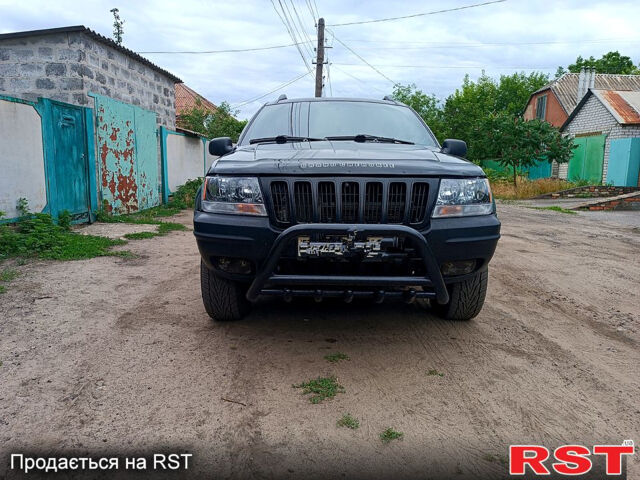 Джип Гранд Чероки, объемом двигателя 2.7 л и пробегом 260 тыс. км за 9500 $, фото 6 на Automoto.ua