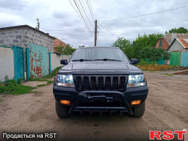 Джип Гранд Чероки, объемом двигателя 2.7 л и пробегом 260 тыс. км за 9500 $, фото 2 на Automoto.ua