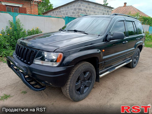 Джип Гранд Чероки, объемом двигателя 2.7 л и пробегом 260 тыс. км за 9500 $, фото 3 на Automoto.ua