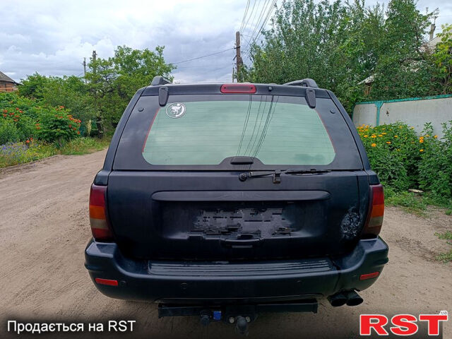 Джип Гранд Чероки, объемом двигателя 2.7 л и пробегом 260 тыс. км за 9500 $, фото 5 на Automoto.ua
