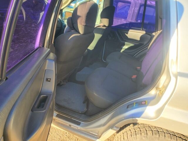 Джип Grand Cherokee 2002 у Краматорске на Automoto.ua Сірий Джип Grand Cherokee, об'ємом двигуна 2.7 л та пробігом 366 тис. км за 5700 $, фото 3 на Automoto.ua