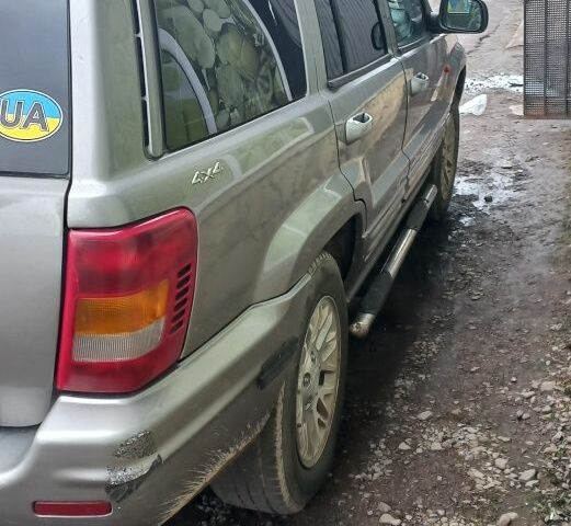 Сірий Джип Grand Cherokee, об'ємом двигуна 0.27 л та пробігом 245 тис. км за 7500 $, фото 5 на Automoto.ua