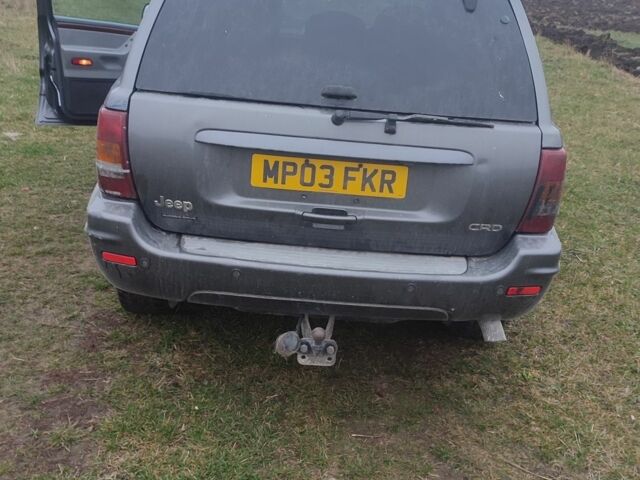 Серый Джип Гранд Чероки, объемом двигателя 2.7 л и пробегом 300 тыс. км за 3574 $, фото 7 на Automoto.ua