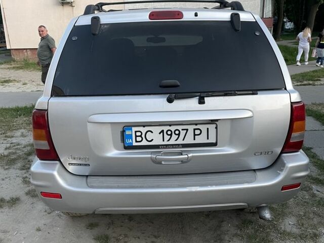 Сірий Джип Grand Cherokee, об'ємом двигуна 0.27 л та пробігом 266 тис. км за 12000 $, фото 2 на Automoto.ua