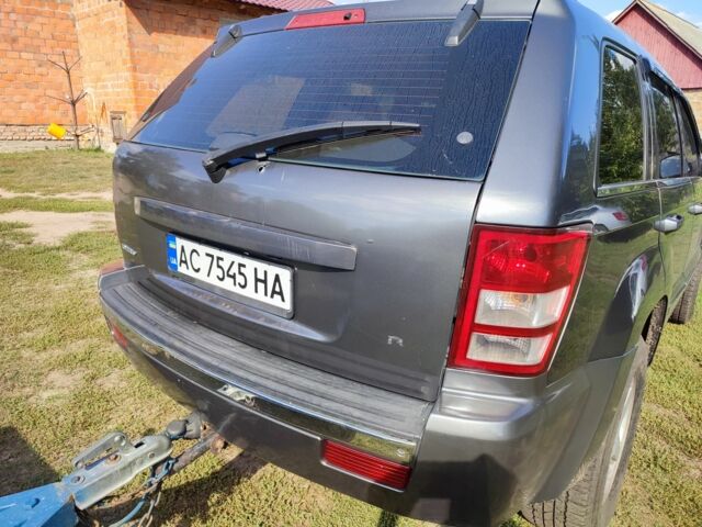 Серый Джип Гранд Чероки, объемом двигателя 3 л и пробегом 340 тыс. км за 5000 $, фото 2 на Automoto.ua