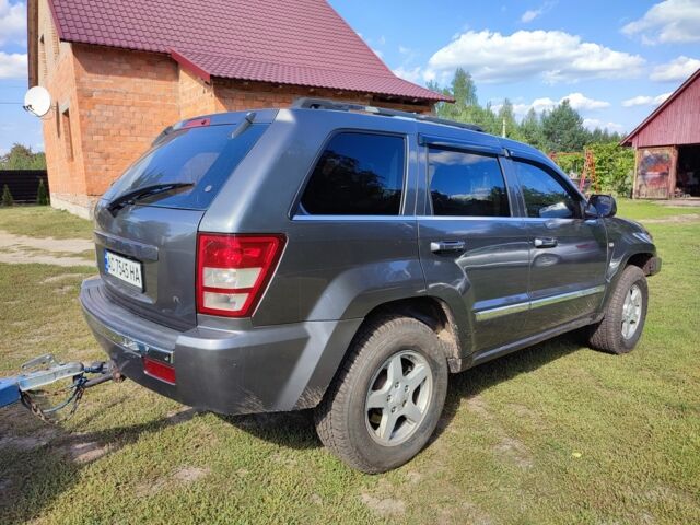 Серый Джип Гранд Чероки, объемом двигателя 3 л и пробегом 340 тыс. км за 5000 $, фото 5 на Automoto.ua