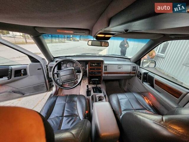 Сірий Джип Grand Cherokee, об'ємом двигуна 5.2 л та пробігом 93 тис. км за 6600 $, фото 7 на Automoto.ua