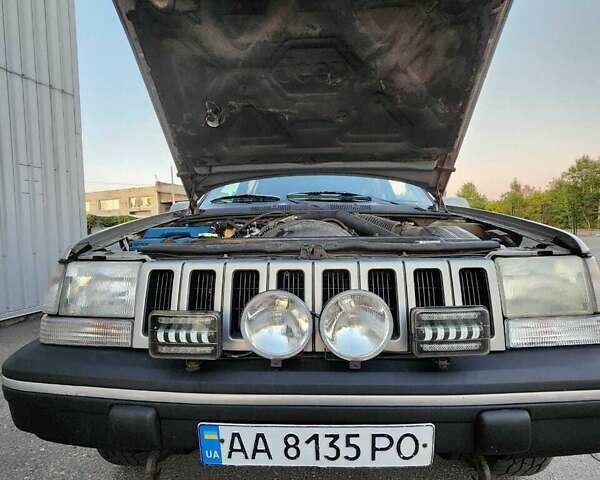 Сірий Джип Grand Cherokee, об'ємом двигуна 5.2 л та пробігом 93 тис. км за 6600 $, фото 11 на Automoto.ua