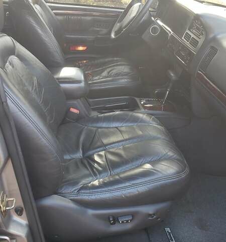 Сірий Джип Grand Cherokee, об'ємом двигуна 5.9 л та пробігом 216 тис. км за 10000 $, фото 13 на Automoto.ua