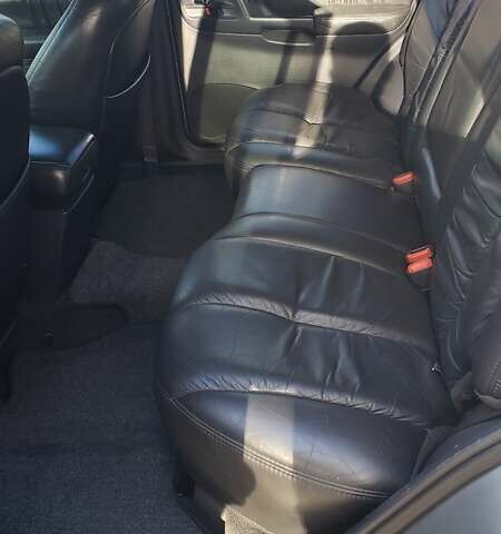 Сірий Джип Grand Cherokee, об'ємом двигуна 5.9 л та пробігом 216 тис. км за 10000 $, фото 11 на Automoto.ua