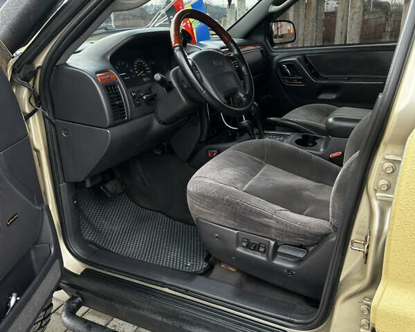 Сірий Джип Grand Cherokee, об'ємом двигуна 4 л та пробігом 230 тис. км за 12500 $, фото 12 на Automoto.ua