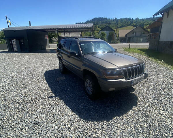 Сірий Джип Grand Cherokee, об'ємом двигуна 4 л та пробігом 164 тис. км за 6750 $, фото 6 на Automoto.ua