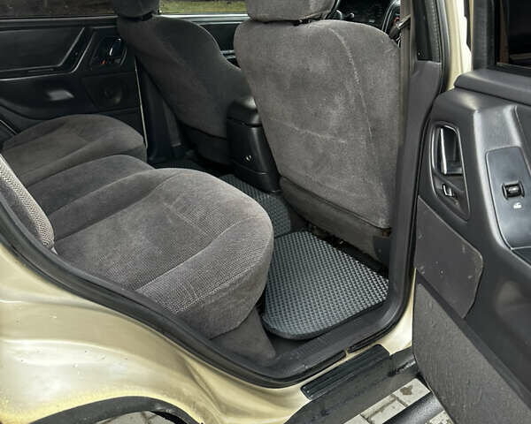 Сірий Джип Grand Cherokee, об'ємом двигуна 4 л та пробігом 230 тис. км за 12500 $, фото 14 на Automoto.ua
