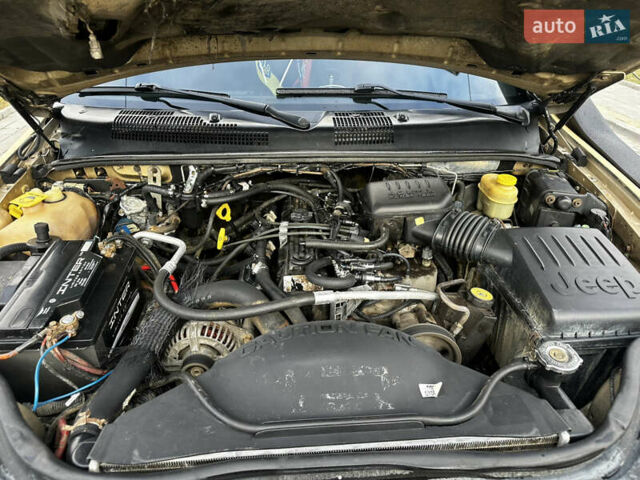 Сірий Джип Grand Cherokee, об'ємом двигуна 4 л та пробігом 230 тис. км за 12500 $, фото 11 на Automoto.ua