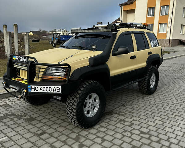 Сірий Джип Grand Cherokee, об'ємом двигуна 4 л та пробігом 230 тис. км за 12500 $, фото 2 на Automoto.ua