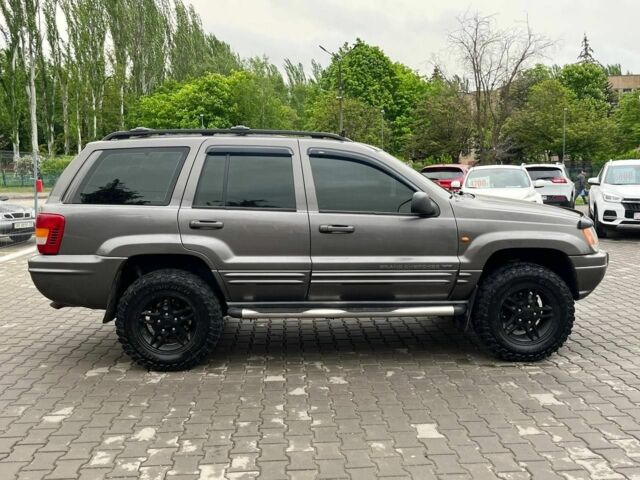 Сірий Джип Grand Cherokee, об'ємом двигуна 0.47 л та пробігом 465 тис. км за 7400 $, фото 7 на Automoto.ua