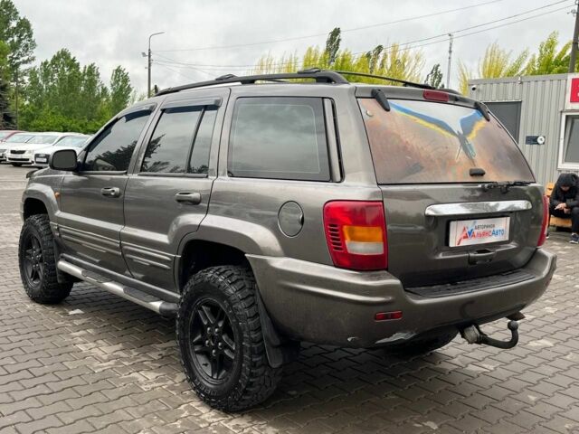 Сірий Джип Grand Cherokee, об'ємом двигуна 0.47 л та пробігом 465 тис. км за 7400 $, фото 4 на Automoto.ua