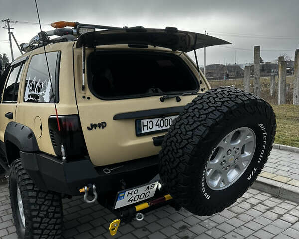Сірий Джип Grand Cherokee, об'ємом двигуна 4 л та пробігом 230 тис. км за 12500 $, фото 9 на Automoto.ua