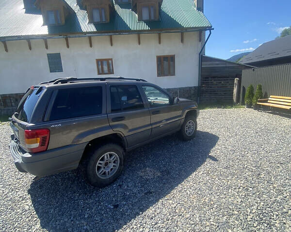 Сірий Джип Grand Cherokee, об'ємом двигуна 4 л та пробігом 164 тис. км за 6750 $, фото 2 на Automoto.ua