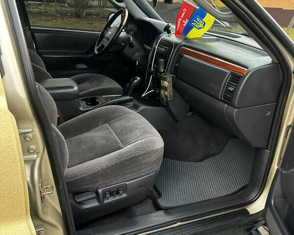 Сірий Джип Grand Cherokee, об'ємом двигуна 4 л та пробігом 230 тис. км за 12500 $, фото 15 на Automoto.ua