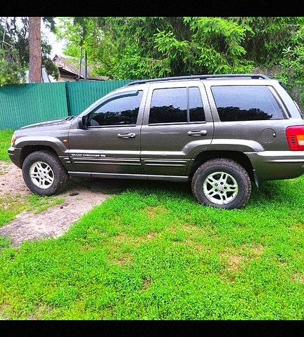 Сірий Джип Grand Cherokee, об'ємом двигуна 4.7 л та пробігом 393 тис. км за 7500 $, фото 2 на Automoto.ua