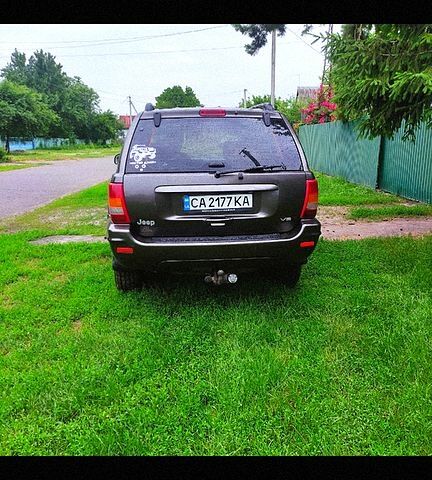 Сірий Джип Grand Cherokee, об'ємом двигуна 4.7 л та пробігом 393 тис. км за 7500 $, фото 3 на Automoto.ua