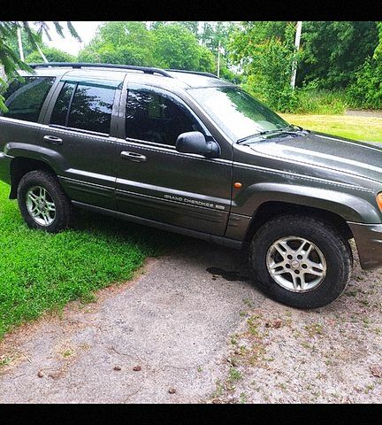 Сірий Джип Grand Cherokee, об'ємом двигуна 4.7 л та пробігом 393 тис. км за 7500 $, фото 1 на Automoto.ua