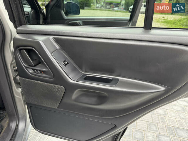 Сірий Джип Grand Cherokee, об'ємом двигуна 4.7 л та пробігом 401 тис. км за 9700 $, фото 15 на Automoto.ua