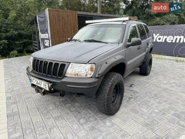 Сірий Джип Grand Cherokee, об'ємом двигуна 4.7 л та пробігом 401 тис. км за 9700 $, фото 1 на Automoto.ua
