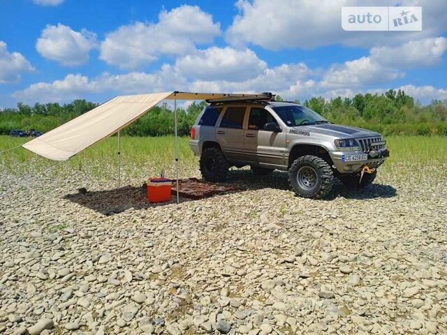 Сірий Джип Grand Cherokee, об'ємом двигуна 3.1 л та пробігом 180 тис. км за 10000 $, фото 4 на Automoto.ua