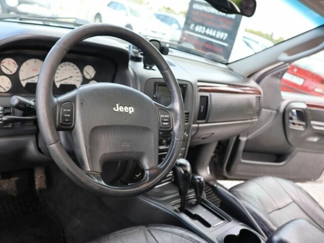 Сірий Джип Grand Cherokee, об'ємом двигуна 2.7 л та пробігом 216 тис. км за 3000 $, фото 5 на Automoto.ua