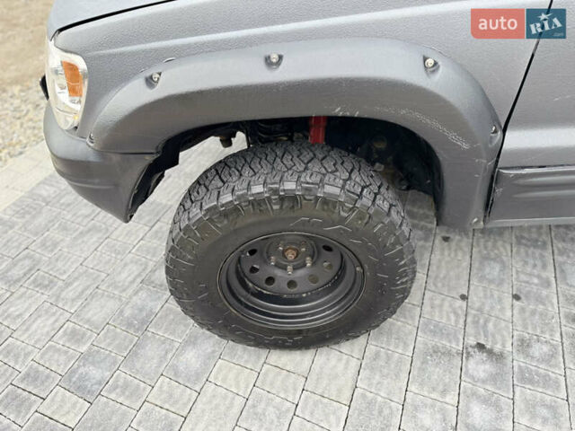 Сірий Джип Grand Cherokee, об'ємом двигуна 4.7 л та пробігом 401 тис. км за 9700 $, фото 2 на Automoto.ua