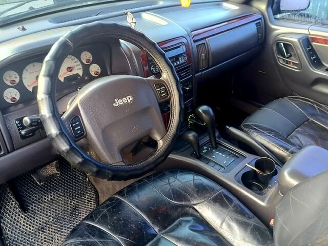 Серый Джип Гранд Чероки, объемом двигателя 3.1 л и пробегом 300 тыс. км за 5800 $, фото 3 на Automoto.ua