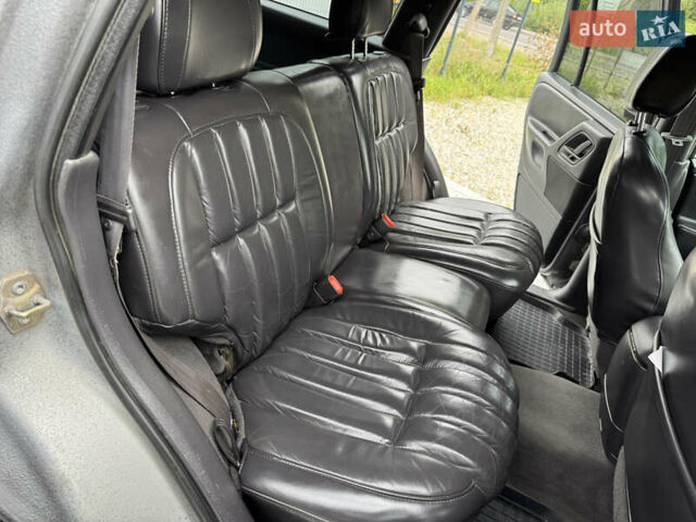 Сірий Джип Grand Cherokee, об'ємом двигуна 4.7 л та пробігом 401 тис. км за 9700 $, фото 12 на Automoto.ua