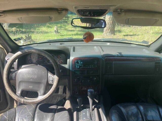 Серый Джип Гранд Чероки, объемом двигателя 3.1 л и пробегом 240 тыс. км за 4800 $, фото 8 на Automoto.ua