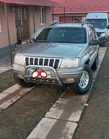 Сірий Джип Grand Cherokee, об'ємом двигуна 3.1 л та пробігом 305 тис. км за 7000 $, фото 3 на Automoto.ua