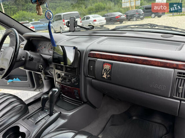 Сірий Джип Grand Cherokee, об'ємом двигуна 4.7 л та пробігом 401 тис. км за 9700 $, фото 20 на Automoto.ua