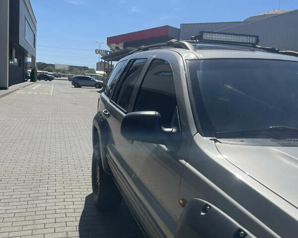 Сірий Джип Grand Cherokee, об'ємом двигуна 3.12 л та пробігом 260 тис. км за 9000 $, фото 10 на Automoto.ua