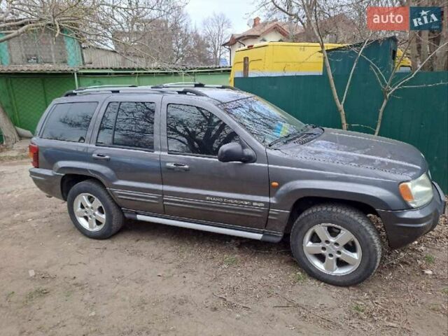 Серый Джип Гранд Чероки, объемом двигателя 3.12 л и пробегом 270 тыс. км за 13000 $, фото 2 на Automoto.ua