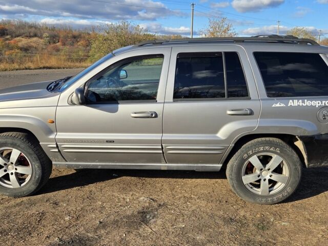 Сірий Джип Grand Cherokee, об'ємом двигуна 3.1 л та пробігом 220 тис. км за 2500 $, фото 1 на Automoto.ua