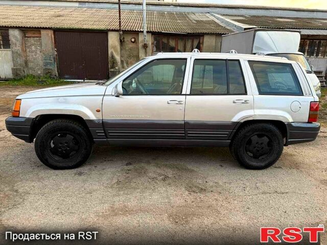 Сірий Джип Grand Cherokee, об'ємом двигуна 3 л та пробігом 280 тис. км за 3000 $, фото 4 на Automoto.ua