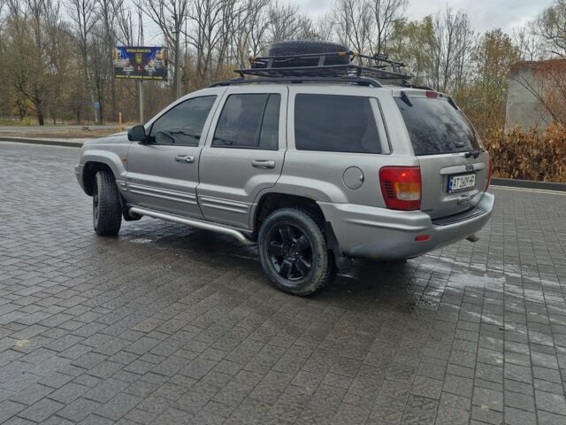 Сірий Джип Grand Cherokee, об'ємом двигуна 4.7 л та пробігом 321 тис. км за 6300 $, фото 5 на Automoto.ua