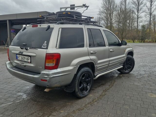 Сірий Джип Grand Cherokee, об'ємом двигуна 4.7 л та пробігом 321 тис. км за 6300 $, фото 4 на Automoto.ua