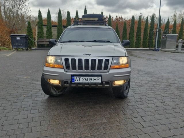 Сірий Джип Grand Cherokee, об'ємом двигуна 4.7 л та пробігом 321 тис. км за 6300 $, фото 1 на Automoto.ua