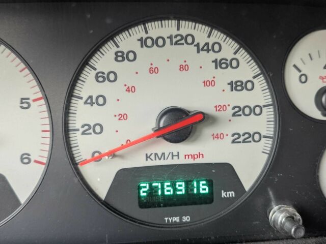 Серый Джип Гранд Чероки, объемом двигателя 3.1 л и пробегом 280 тыс. км за 4518 $, фото 4 на Automoto.ua