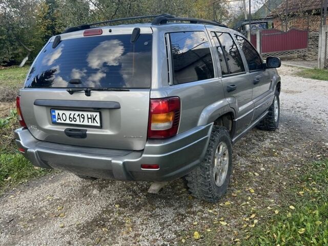 Сірий Джип Grand Cherokee, об'ємом двигуна 3.1 л та пробігом 271 тис. км за 7999 $, фото 2 на Automoto.ua